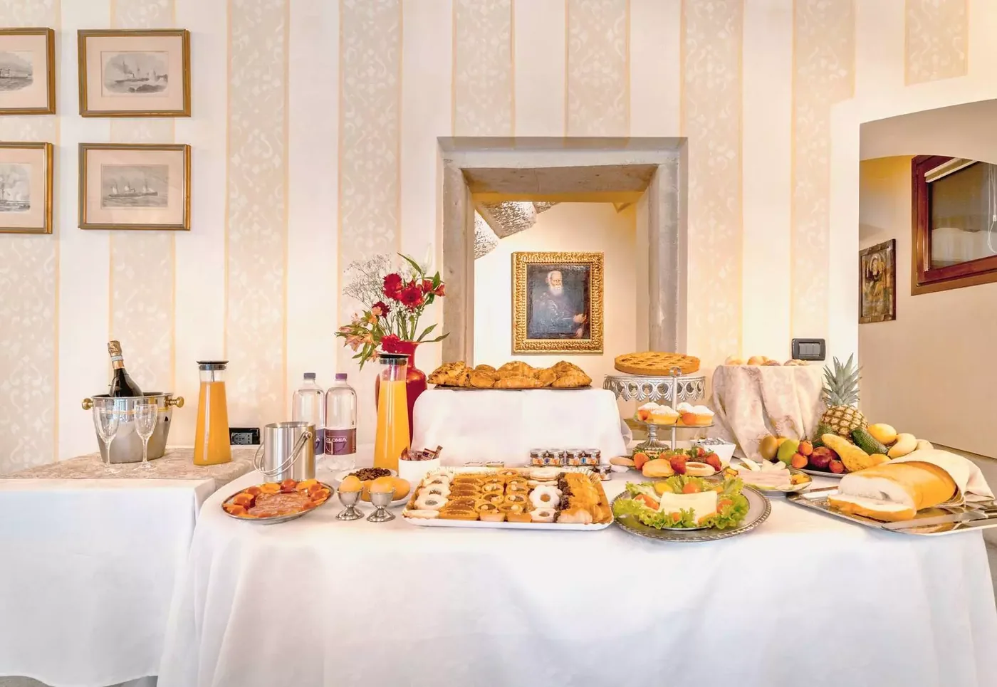The breakfast buffet at Palazzo Vitturi with pastries and fresh fruit