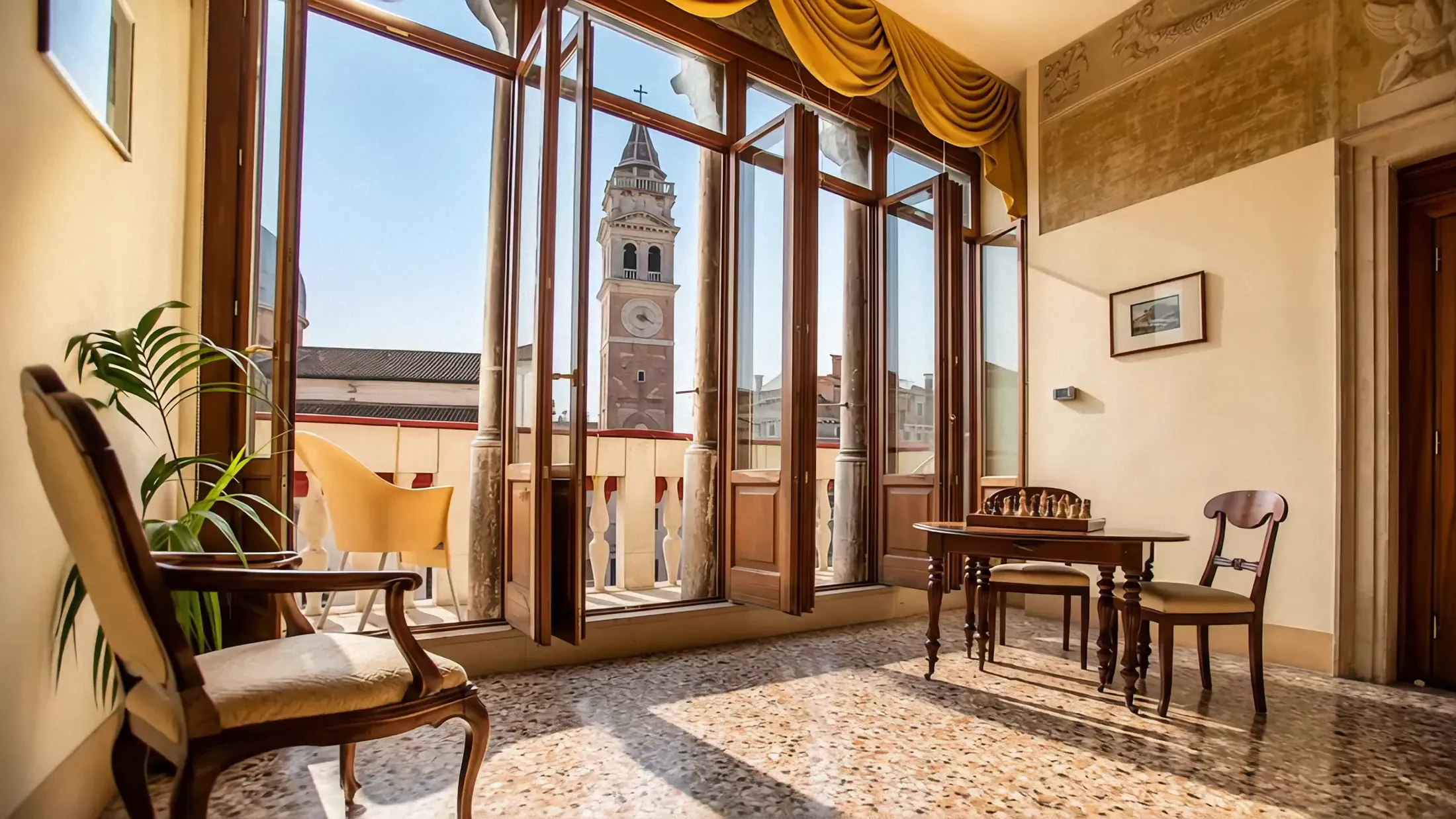The noble hall of Palazzo Vitturi overlooking the dome and bell tower of Santa Maria Formosa, Venice
