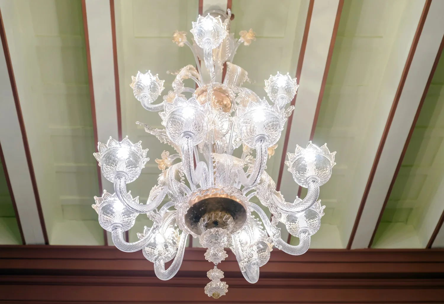Murano chandelier under the decorated ceiling of Palazzo Vitturi