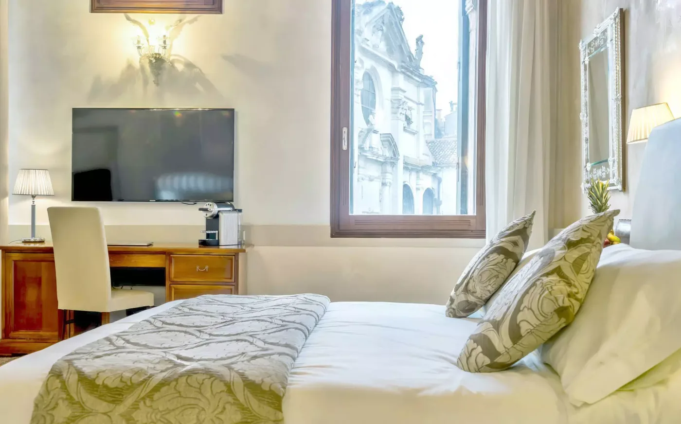 Room at Palazzo Vitturi with a view of the campo and natural light