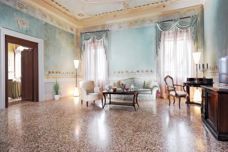 The frescoed lounge of the Suite at Palazzo Vitturi